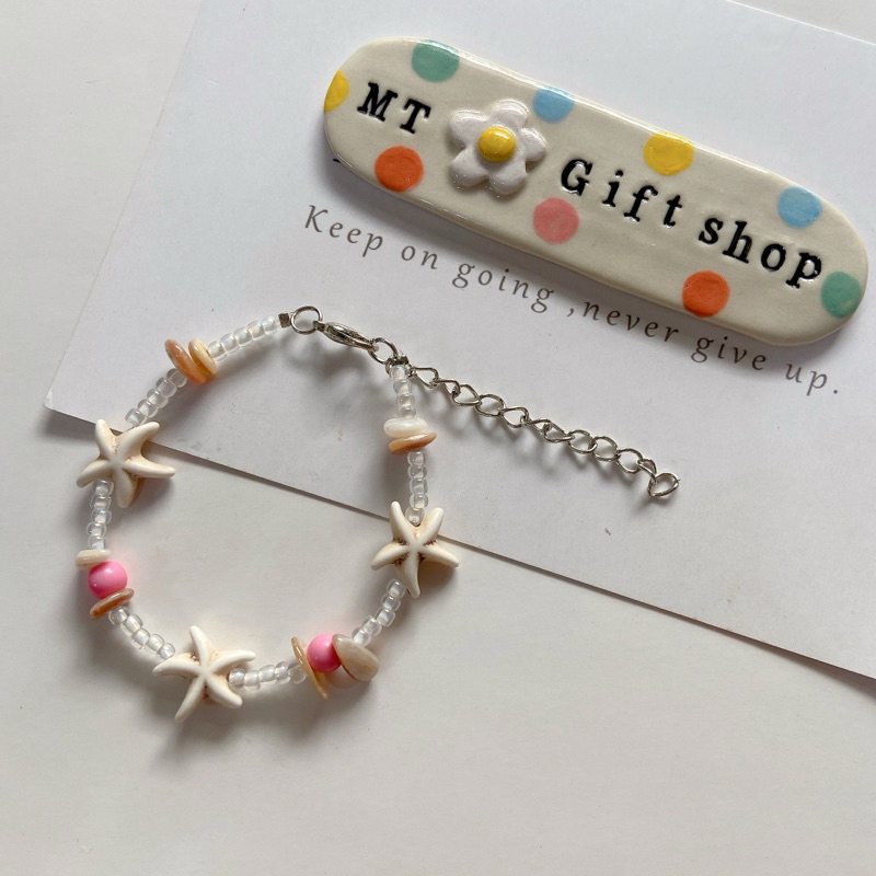 B024 ข้อมือลูกปัดลายทะเล จี้ปลาดาว