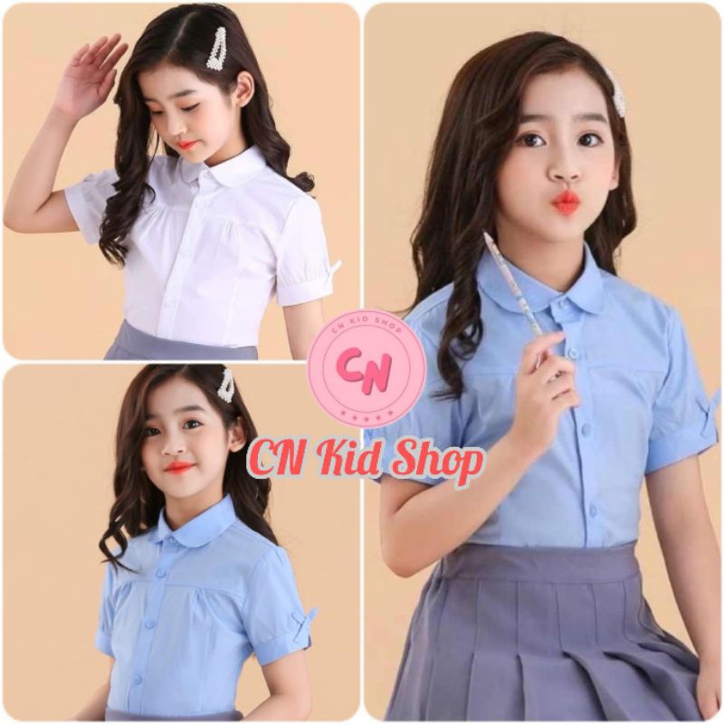 (พร้อมส่ง) เสื้อเชิ้ตเด็กผู้หญิงแขนสั้นแต่งโบว์ปลายแขนน่ารักๆ