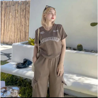 OT ชุดผ้ามูนเวฟ เสื้อแขนสั้นคอกลมเอวจั้ม สกีนลาย Celinie + กางเกงขายาวคาโก้แต่งแถบข้างมีกระเป๋า 4 จุด (สวยมาก ฮิตสุดๆ)