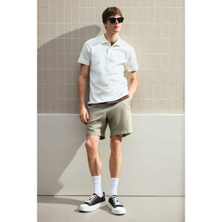 H&M(เอชแอนด์เอ็ม) เสื้อโปโล ทรง Slim Fit ผู้ชาย 1289848