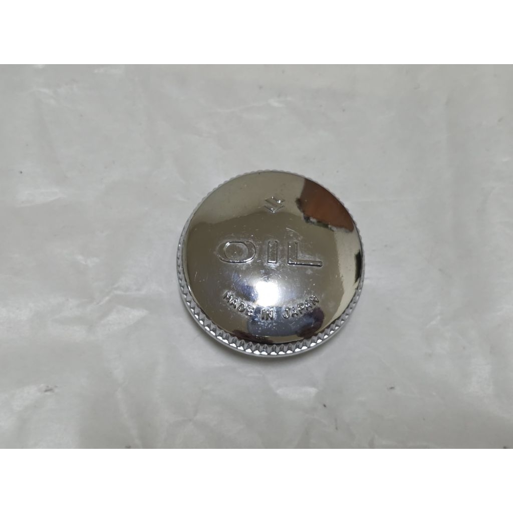 ฝาปิดถังออ​โต้​ลูป​ Suzuki​ A100​ K125​ งานเก่า มีริ้วรอย