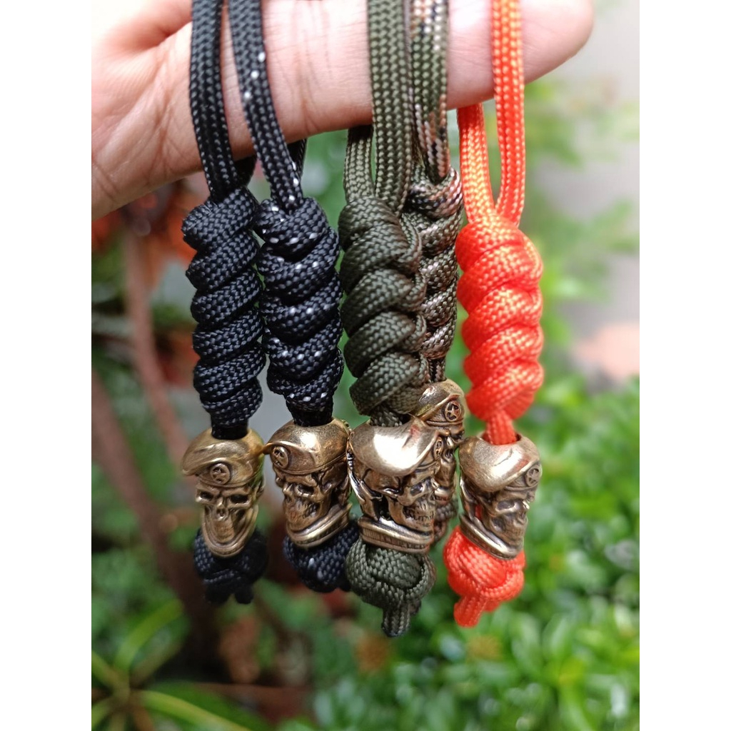 สายแลนยาร์ด แลนยาร์ด (knife lanyard, paracord bead) พาราคอร์ด ลูกปัด พวงกุญแจ ถักด้วย Paracord 4mm ลูกปัดหัวกะโหลกทหาร – โปรปัง