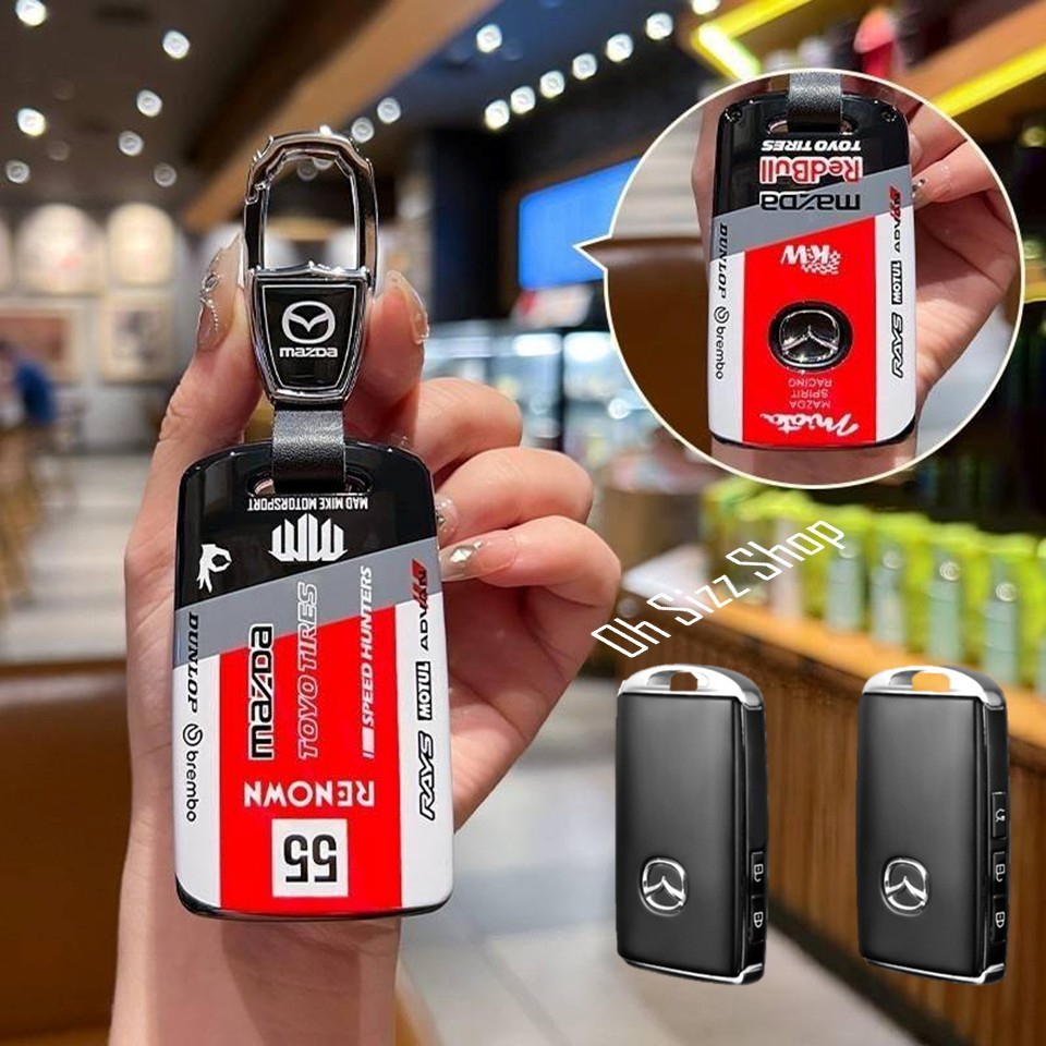 เคสรีโมทรถ Mazda 2025  ปุ่มข้าง  ลาย Sport ด้านในกันกระแทกปิดปุ่ม TPU กดได้ (Sport Key ABS Key Cover with push button Gu
