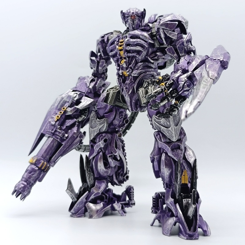 Shockwave Transformation ของเล่นภาพยนตร์รุ่น รถการเปลี่ยนรูปเครื่องหุ่นยนต์ของเล่นรุ่น TW1028