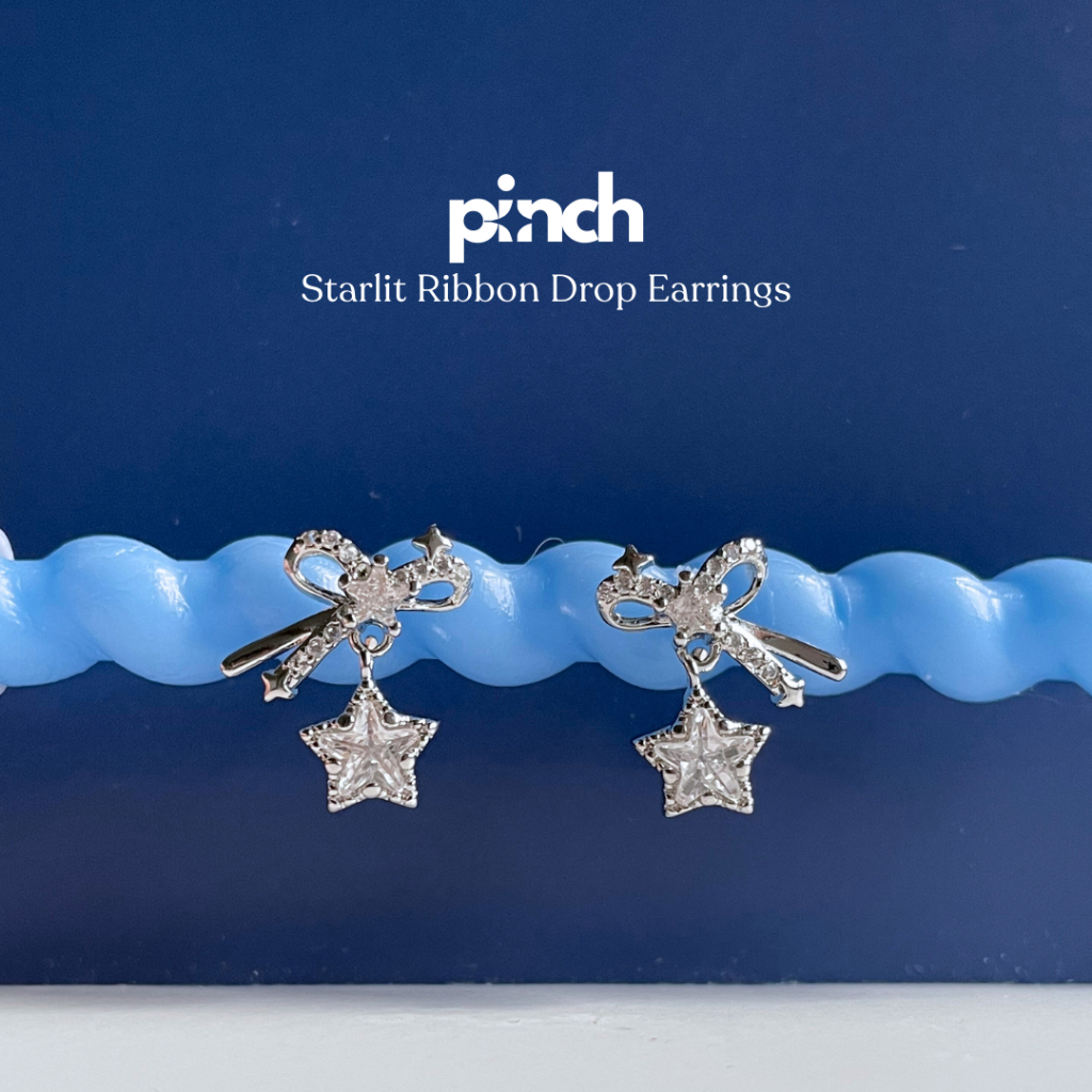 Pinch Starlit Ribbon Drop Earrings ต่างหูโบว์ห้อยดาว ก้านเงินแท้ S925