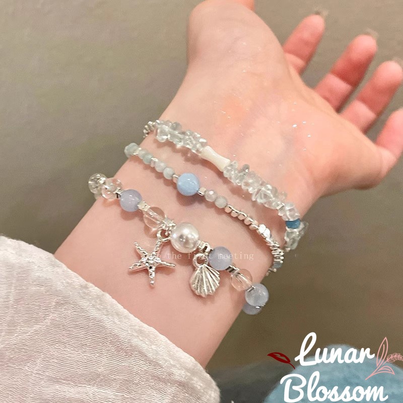 Lunar Blossom✨✨สร้อยข้อมือแฟชั่นสไตล์เกาหลี สร้อยข้อมือโบฮีเมียนปลาดาว อุปกรณ์ best seller หญิง