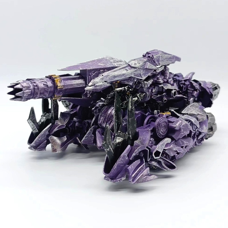 Shockwave Transformation ของเล่นภาพยนตร์รุ่น รถการเปลี่ยนรูปเครื่องหุ่นยนต์ของเล่นรุ่น TW1028