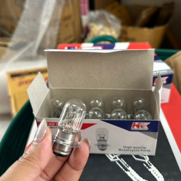 หลอดไฟหน้ามอเตอร์ไซค์ 12V 35/35W. สี(วอมไวท์) ขั้ว2จุด (1กล่อง 10หลอด)