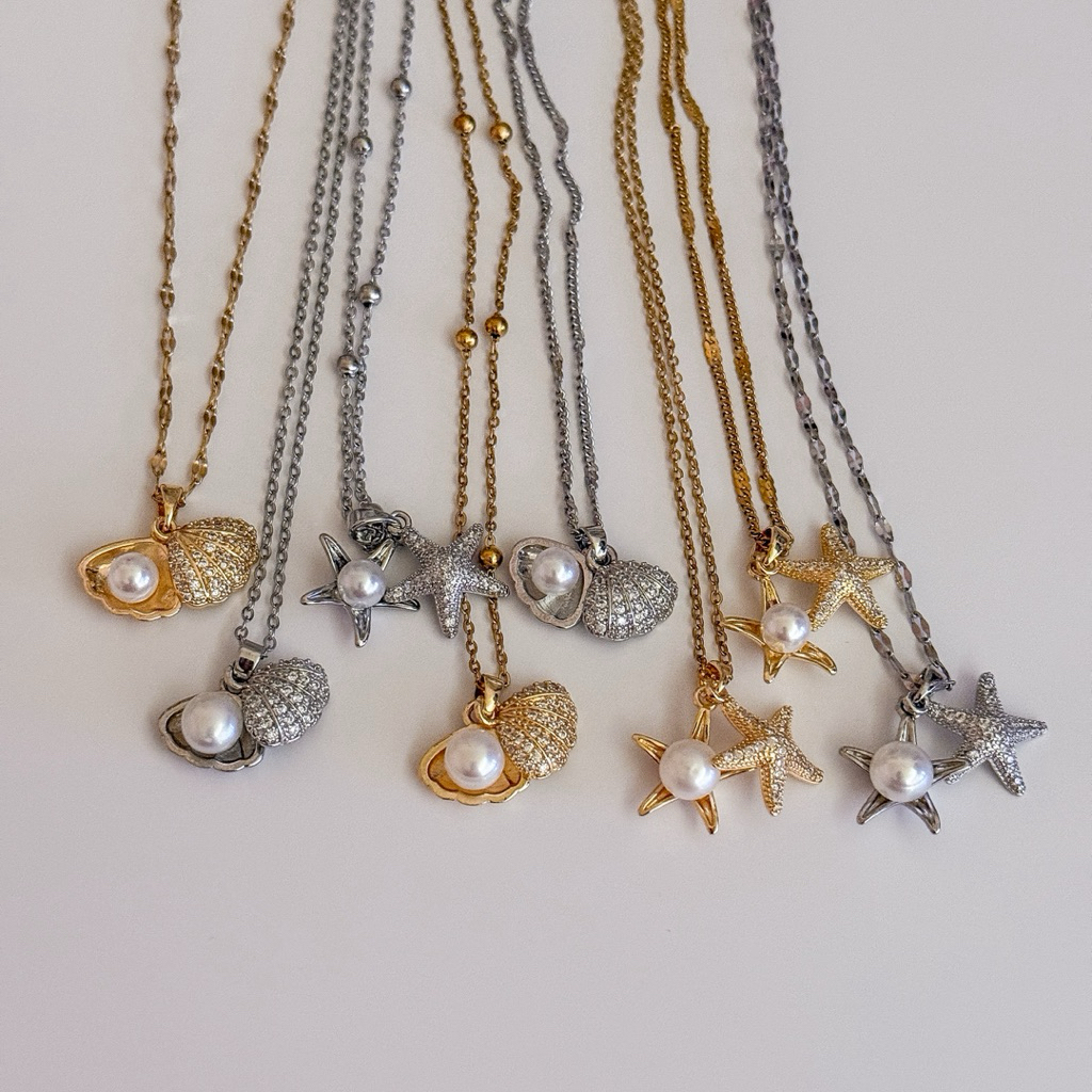 shellandgold - สร้อยคอจี้ปลาดาวและจี้เปลือกหอยตลับ มีดีเทลตรงจี้แบ่งออกเป็น 2 ชิ้น