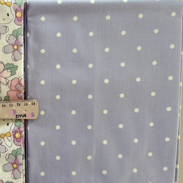 ผ้าคอตตอน 100% คอตตอนทอทวิล ผ้าเมตร ตัดขายเป็นเมตร ผ้าหน้ากว้าง 1.6 เมตร ลายกระต่ายดอกไม้สีม่วง