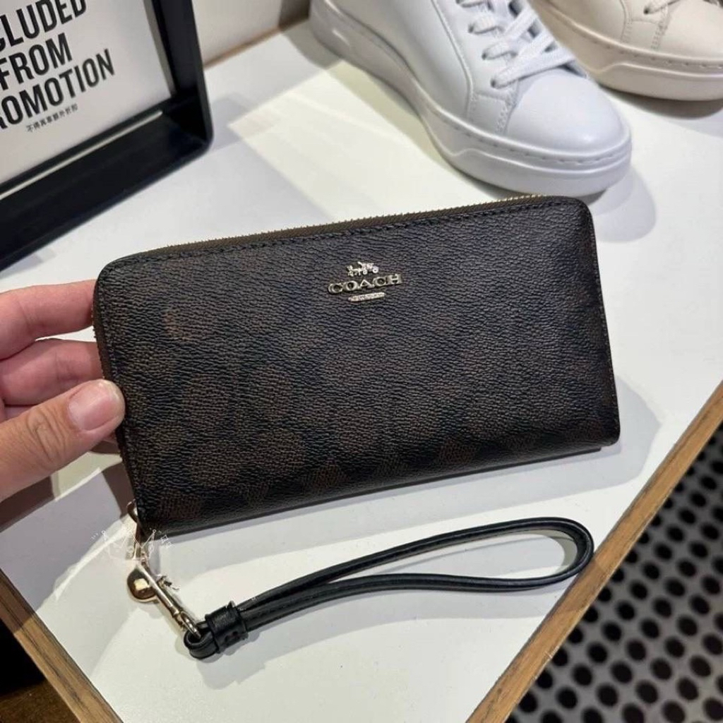 coach zip wallet signature