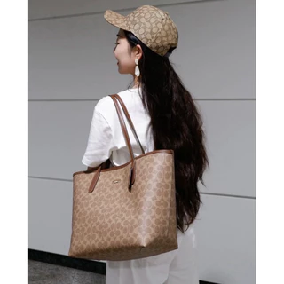 COACH กระเป๋าสะพายไหล่ รุ่น CITY TOTE IN SIGNATURE CANVAS มีหลายสีให้เลือก
