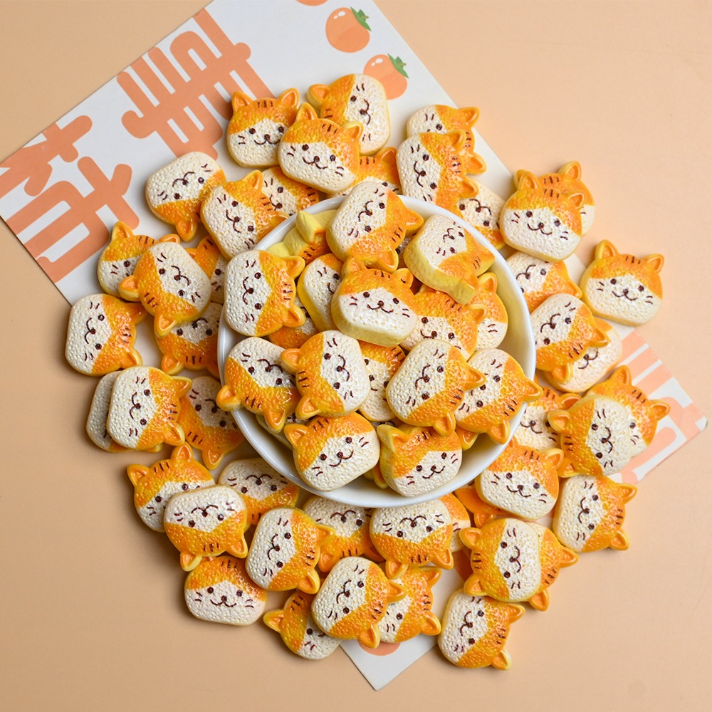 j714ขนมปังหน้าแมวยิ้มจิ๋วของเล่นแพ็คละ 10ชิ้น