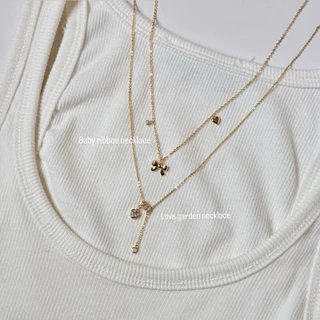 TROPHIES.CO - Baby ribbon necklace สร้อยคอโบว์ หัวใจ เพชร