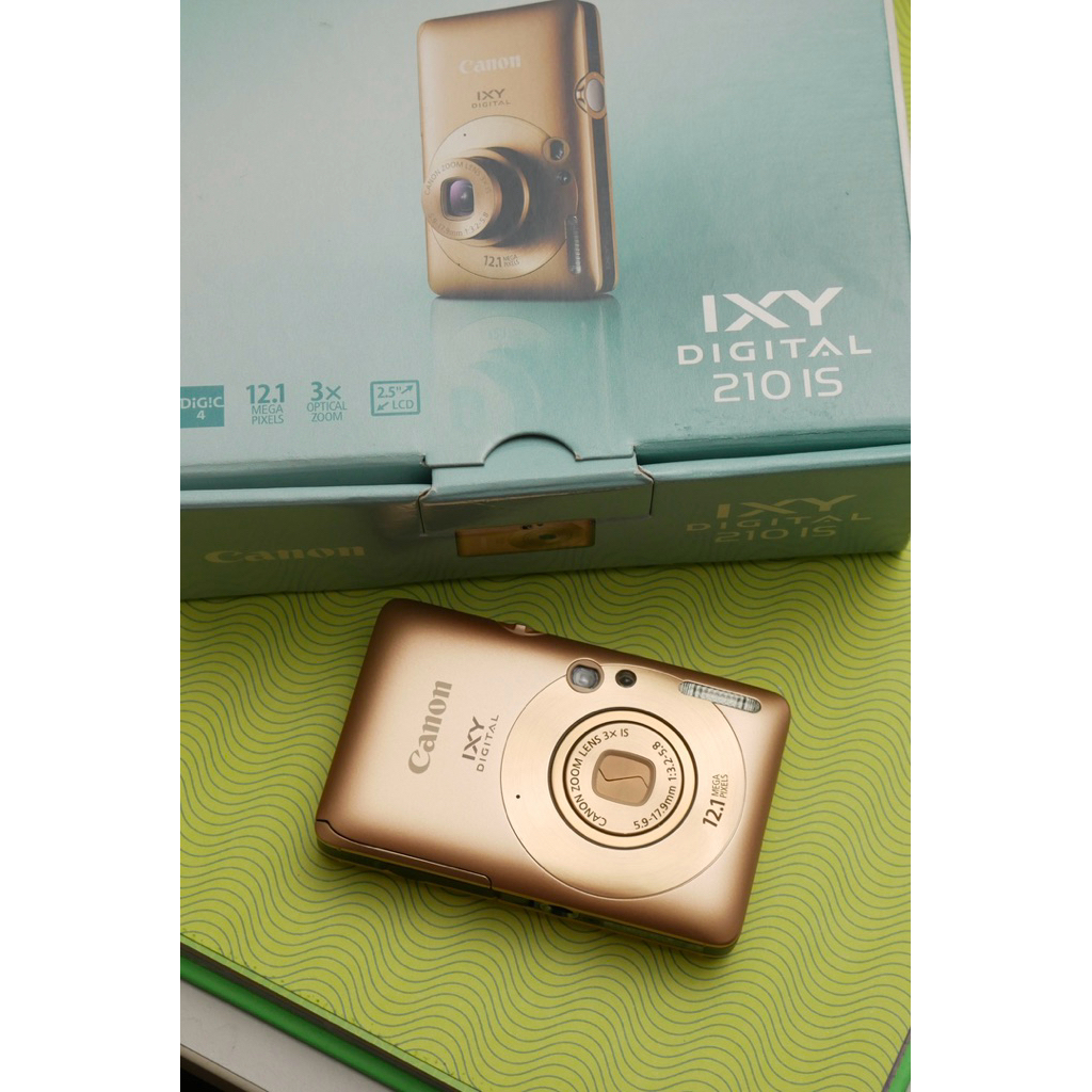 กล้องดิจิตอล Canon IXY210is (gold) Box