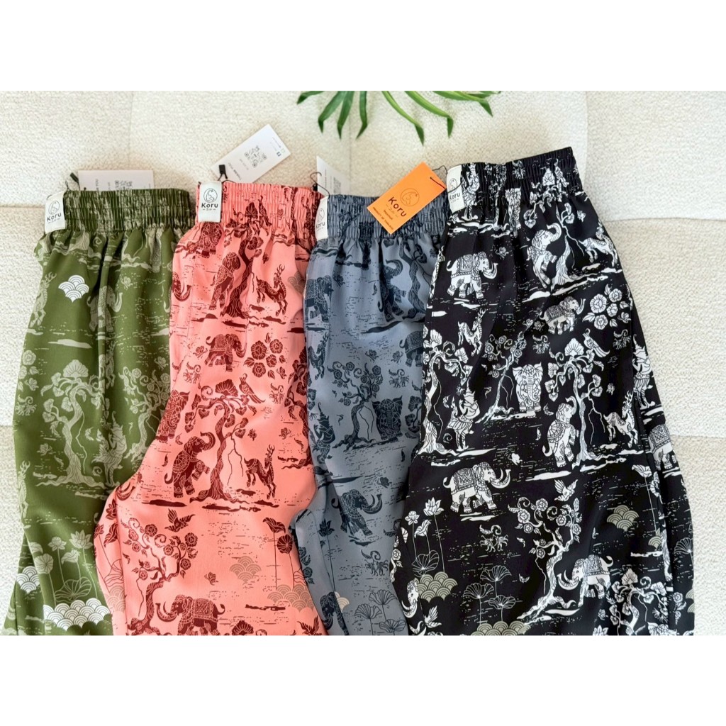 KORU กางเกงขากระบอกเล็ก ลายช้างหิมพานต์