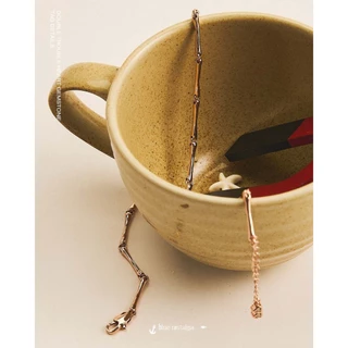 Julys - whimsy bone necklace