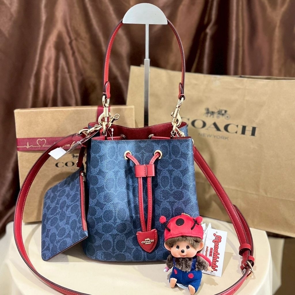 COACH  ROWAN BUCKET BAG IN SIGNATURE CANVAS CBH07