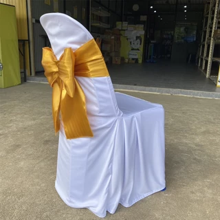 ผ้าคลุมเก้าอี้ พร้อมโบว์ต่วนสีทอง ผ้าสวมเก้าอี้ ผ้าคลุมเก้าอี้พลาสติก (รุ่นปกติจีบข้าง) ใช้สำหรับงานพิธี งานแต่ง อื่นๆ