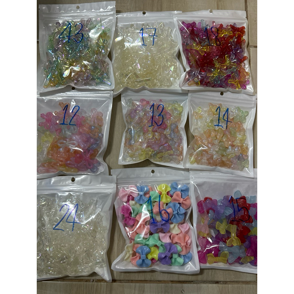 ลูกปัดตกแต่งโบว์สวยๆ1ถุงมี100กรัม60฿