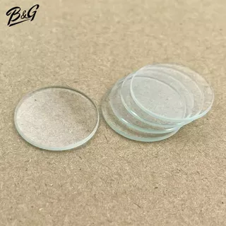 อะไหล่กระจกหน้าปัดหน้าฬิกาแบบแบนราบ หนา1&1.5 mm มีขนาดเส้นผ่าศูนย์กลาง 26.0 ถึง 35.5 มิล (ไม่ใช้ฟิล์มกระจกไม่มีกาวในตัว)