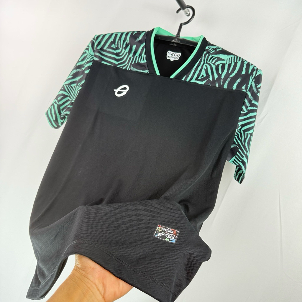 EGO SPORT เสื้อกีฬาคอวี พิมส์ลาย ZOOTOPIA ZEBRA รหัส EG-5166 ของท้ 100% ใหม่ล่าสุด