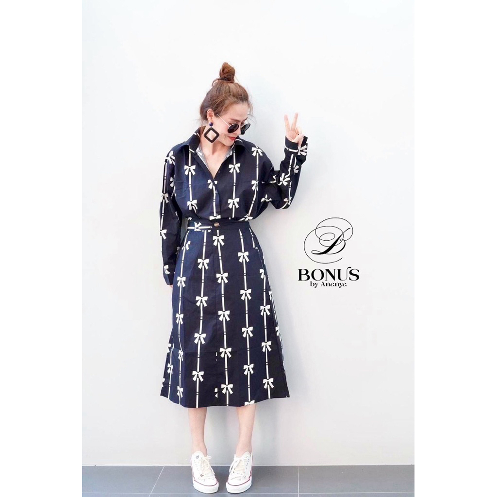 เซ็ตเสื้อคอกลม+ กระโปรงลายดอกไม้สีสันสดใส รูปที่ 3