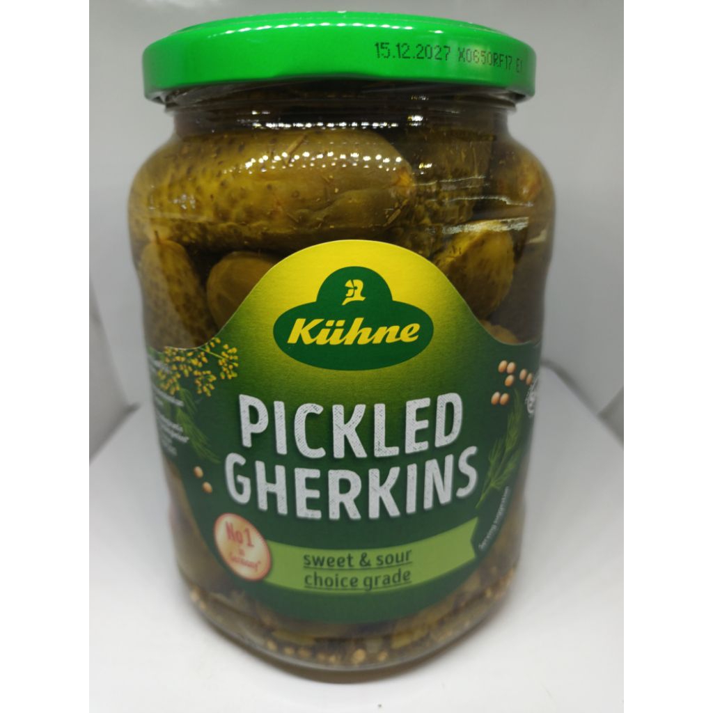 Pickled Gherkins Crunchy gherkins 670 g in a savoury infusion with fine herbs and delicate spices.Eingelegte Gewürzgurk