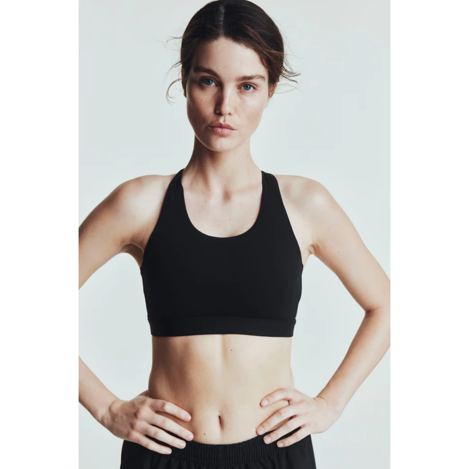 H&M(เอชแอนด์เอ็ม) เสื้อในกีฬาแบบสนับสนุนกลาง พร้อมเทคโนโลยี DryMove™ ผู้หญิง 1294761