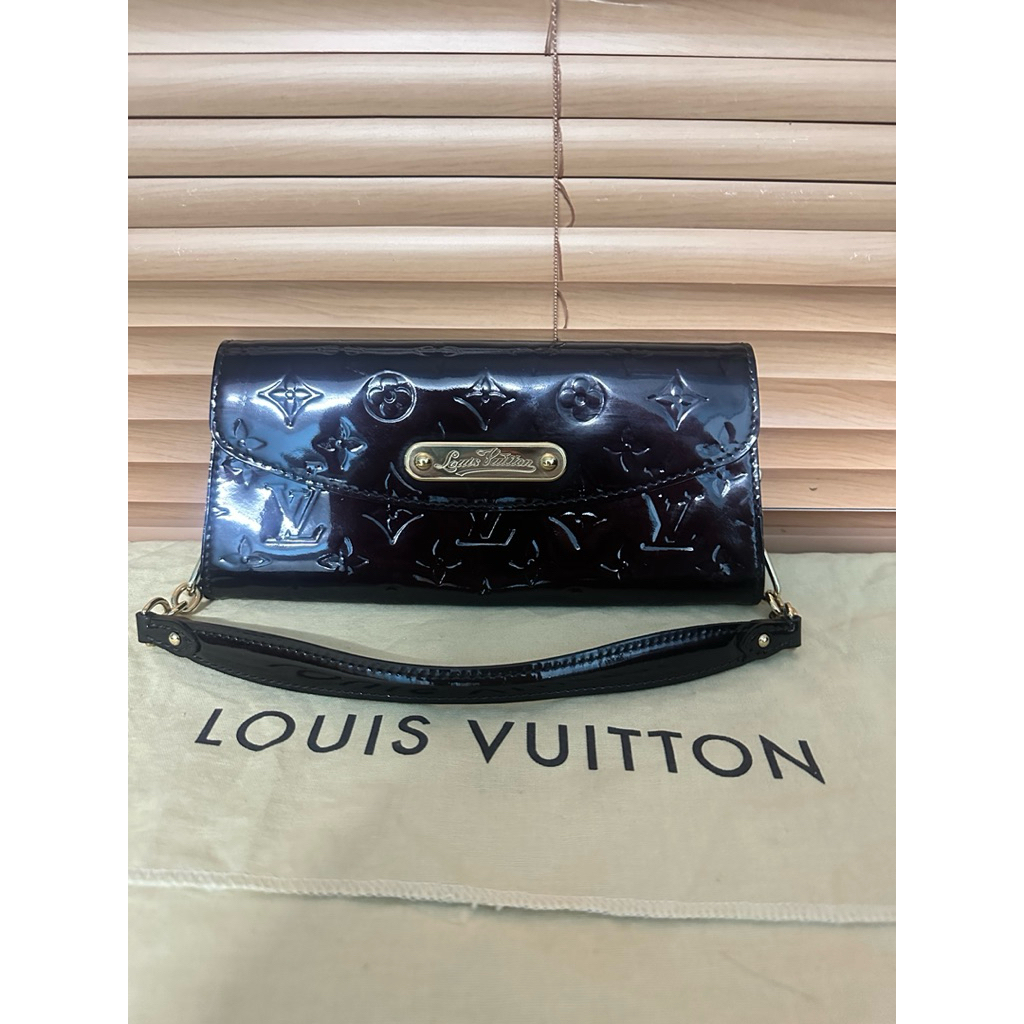 lv sunset boulevard clutch