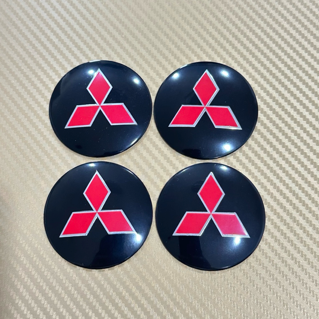 โลโก้  Mitsubishi  โลโก้ฝาครอบล้อ โลโก้ติดดุมล้อ ขนาด : เส้นผ่าศูนย์กลาง 56 mm / 60 mm ( ราคาต่อชุด มี 4 ชิ้น )