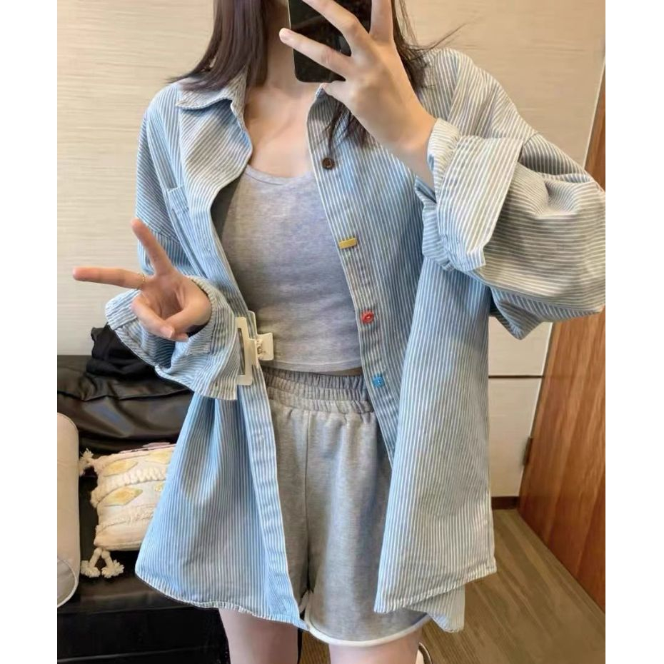 เสื้อเชิ้ตแขนยาวผู้หญิง ดีไซน์ลายทางสีน้ำเงิน ทรงหลวม และเสื้อตัวบนอเนกประสงค์แบบลำลอง
