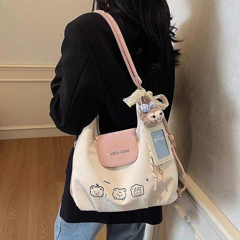 KKK กระเป๋าสะพายไหล่สาวน่ารัก กระเป๋าหิ้วความจุขนาดใหญ่ กระเป๋าเป้สะพายหลังเฉพาะ