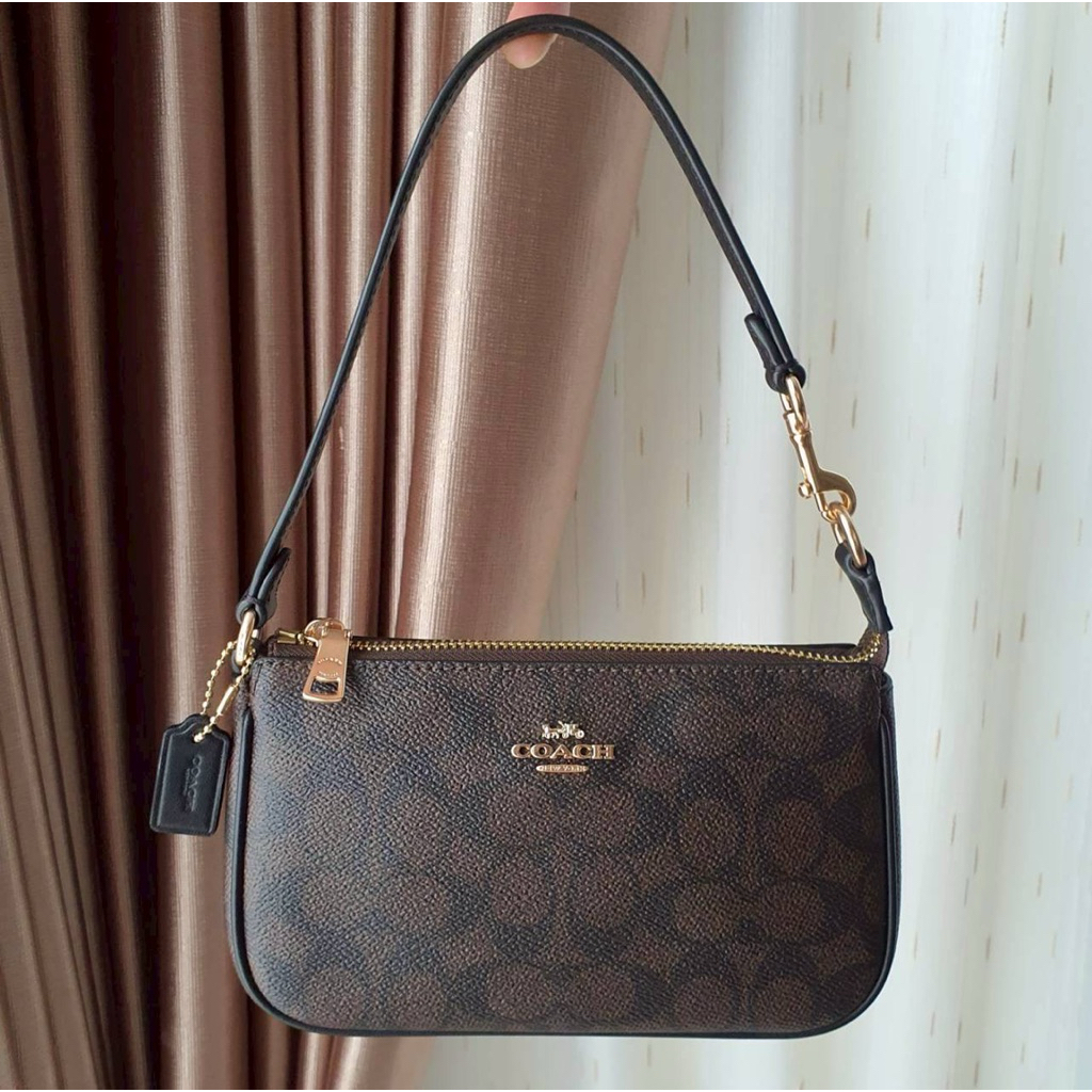 NOLITA 19 IN SIGNATURE CANVAS (COACH CW426)