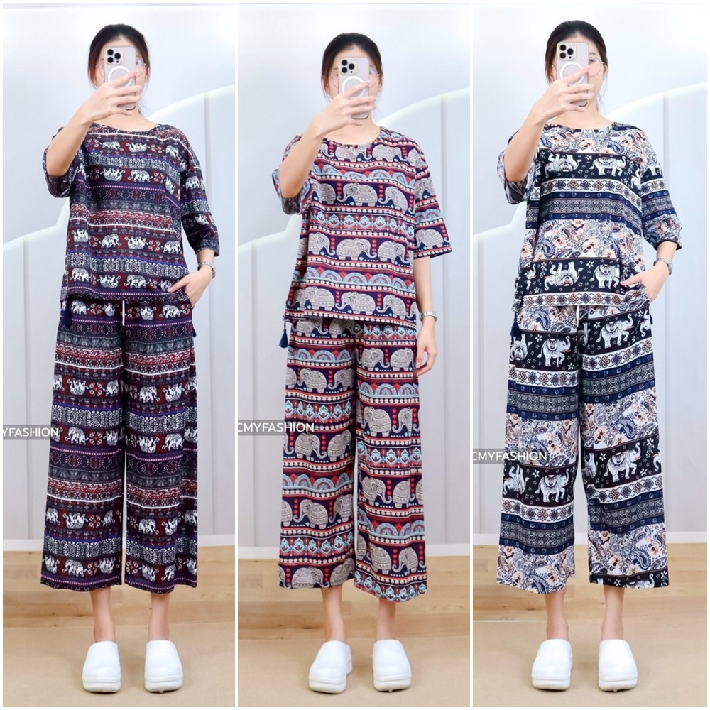 **สินค้ามาใหม่ พร้อมส่ง** ชุดเซ็ท ผู้หญิง เสื้อคอกลม แขนสั้น แต่งพู่ กางเกงขายาว ทรงขาบาน พิมพ์ลายช้าง ผ้าหนังไก่ c2027#