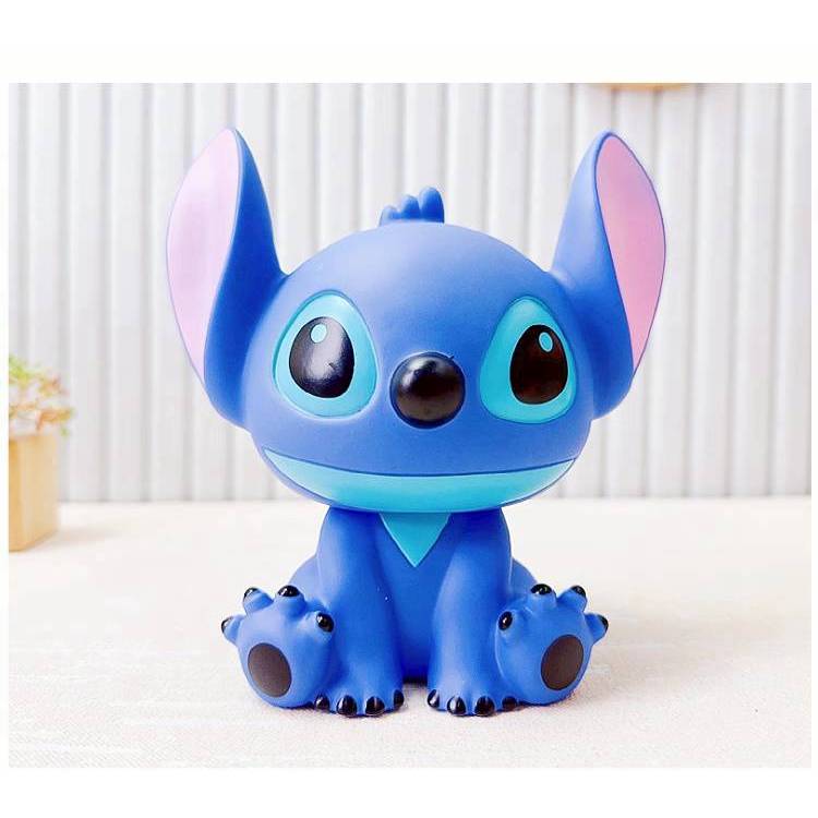 กระปุกออมสินสติชและแองเจิลรุ่นใหม่ เป็นพลาสติกตกไม่แตก ขนาดแจ้งในภาพค่ะ