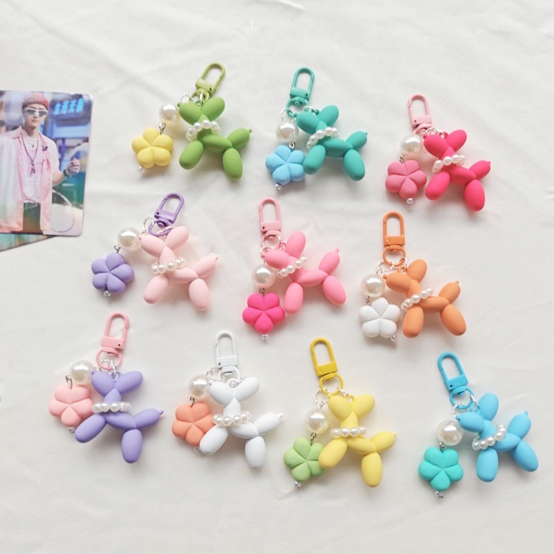 (B-2061) เลียนแบบที่มีสีสันบอลลูนมุกพวงกุญแจสุนัขดอกไม้หวานพวงกุญแจหูฟังกรณีจี้ของขวัญเครื่องประดับของที่ระลึก
