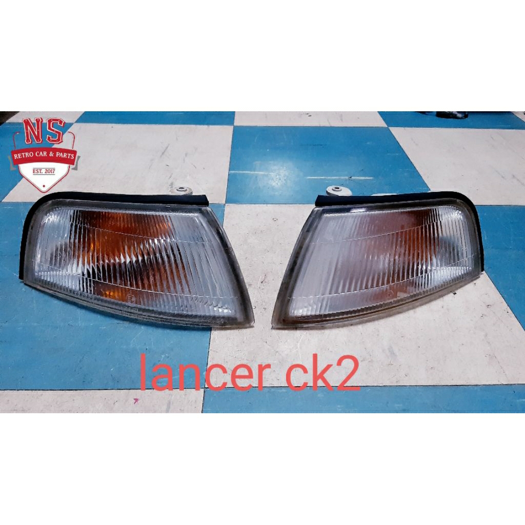 ไฟมุม mitsubishi lancer ck2 (ท้ายเบ๊นซ์) ของแท้มือสอง