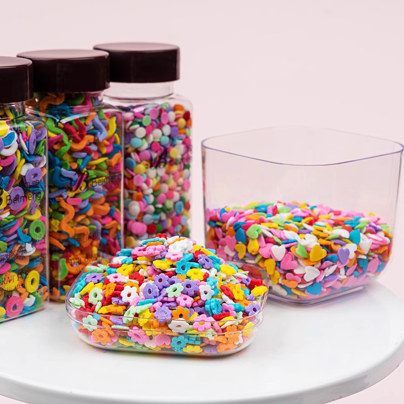 แบ่งขาย เม็ดน้ำตาล Sprinkles เม็ดน้ำตาลตกแต่งรูปดาว (แบ่งขาย 25 กรัม)