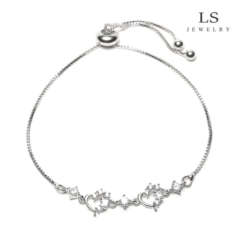 LS สร้อยข้อมือแฟชั่นสำหรับผู้หญิง สร้อยข้อมือคู่รัก เคลือบทองคำขาว จี้หัวใจกลวงฝังคริสตัล เครื่องประดับสวยโรแมนติก b2864