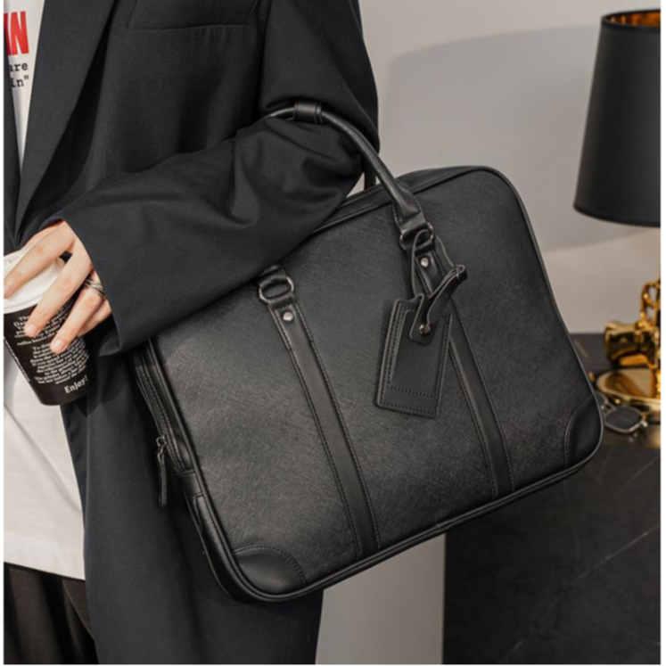 กระเป๋าถือผู้ชาย ในเเนวธุรกิจ ใส่เอกสาร  ใส่ Notebook 13-14 นิ้ว ในตัวกระเป๋าได้ (ออกเเบบให้ถือได้อย่างเดียว)