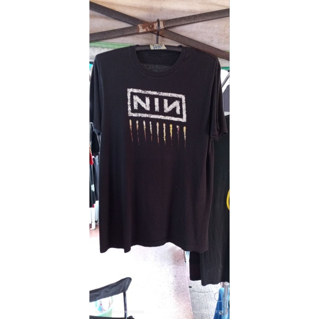 เสื้อยืดงานวงดนตรีNIN