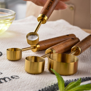 ช้อนตวง ถ้วยตวงสแตนเลสสีทอง ด้ามไม้จริง ราคาต่อ 1 ชิ้น ( 1.2…