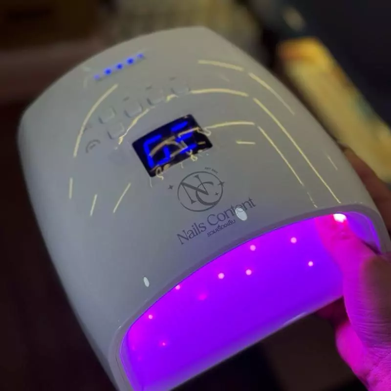 เครื่องอบเล็บเจลไฟสีชมพู ระบบ ไร้สายไฟถนอมมือ Nails content 66 watts