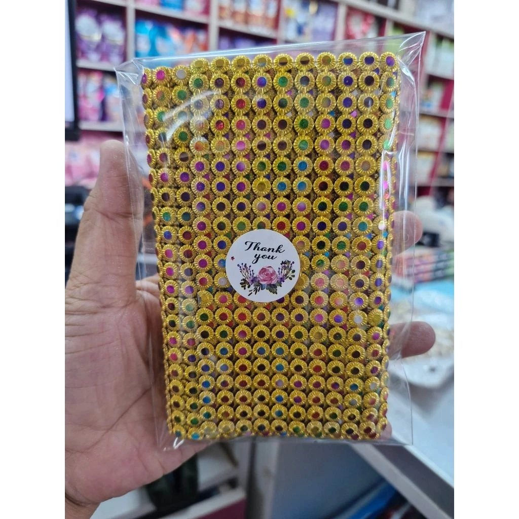 สังวาลย์พลอยรุ้งกลมจิ่วสีทองขนาด 5มิล ยาว  90cm (1หลา)  2700 เม็ด ตกแต่งเหรียญโปรยทาน  ง