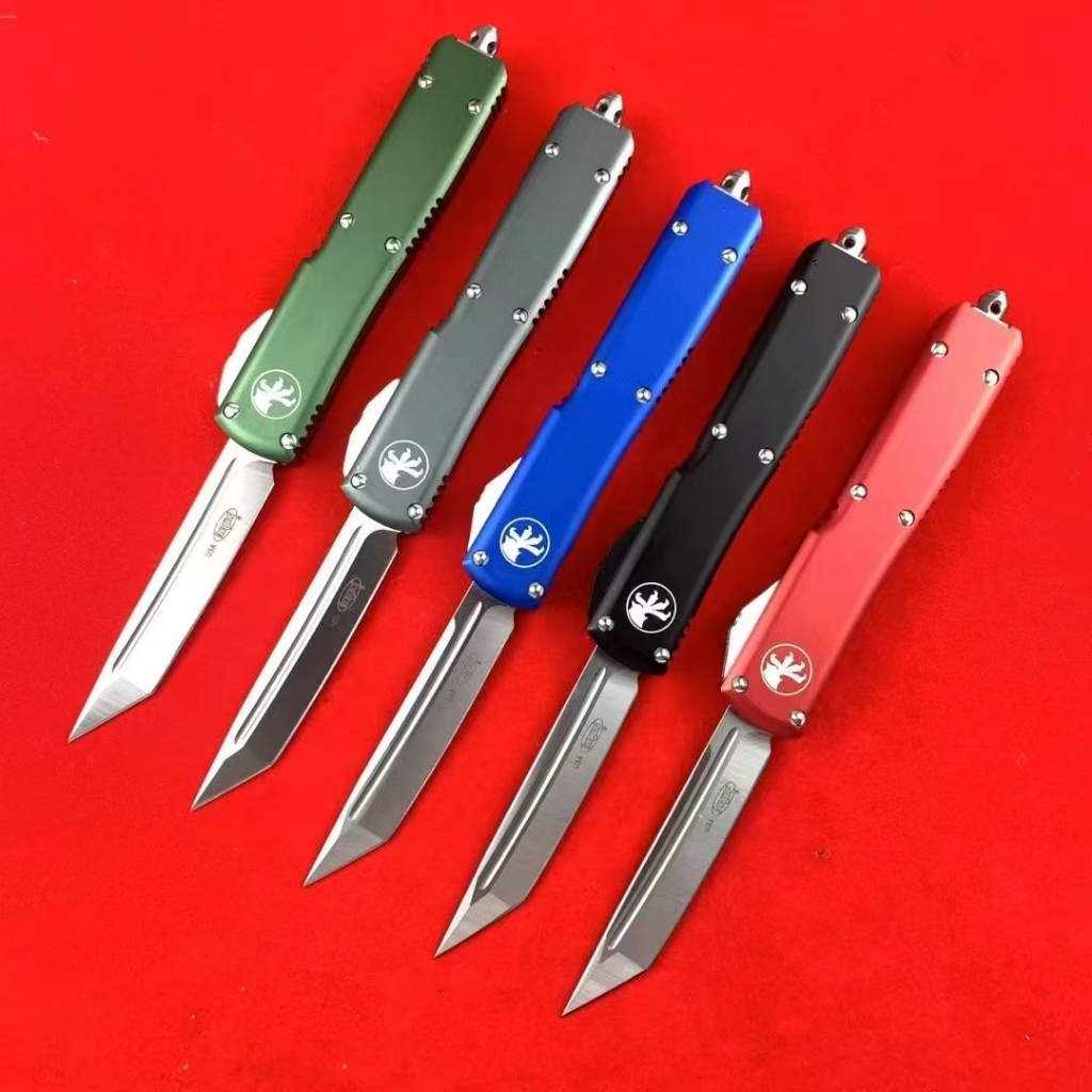 USA.Microtech ไมโครเทคโนโลยี UT85-OTF  วัสดุตัดขอบ: D2 วัสดุก้าน: อลูมิเนียมอัลลอยด์ออกซิเดชัน ความแ