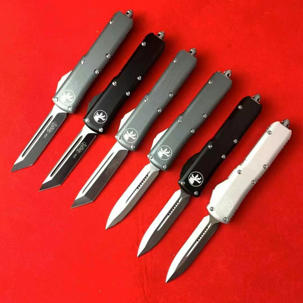 USA.Microtech ไมโครเทคโนโลยี UT85-OTF (ขนาดกลาง)  วัสดุตัดขอบ: D2 วัสดุก้าน: อลูมิเนียมอัลลอยด์ออกซิ