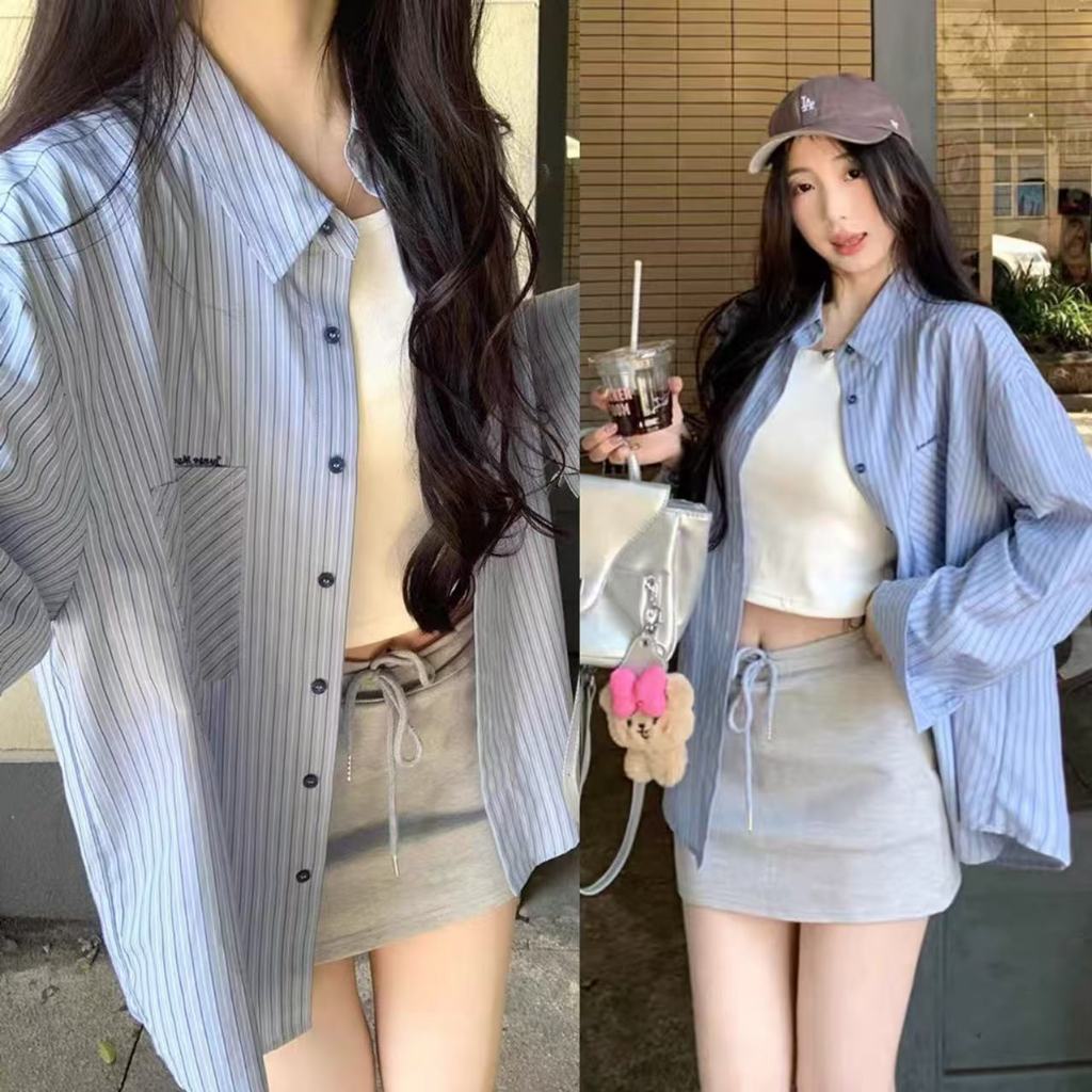 เสื้อลายทางสีน้ำเงินเฉพาะกลุ่มเย็บปักถักร้อยลำลองเสื้อแขนยาวหลวมแสดงผอมด้านบน Moonlite.th