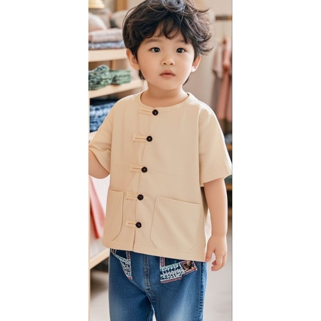 เสื้อผ้าฝ้ายเด็ก กระดุมผ่าหน้า สีพื้น