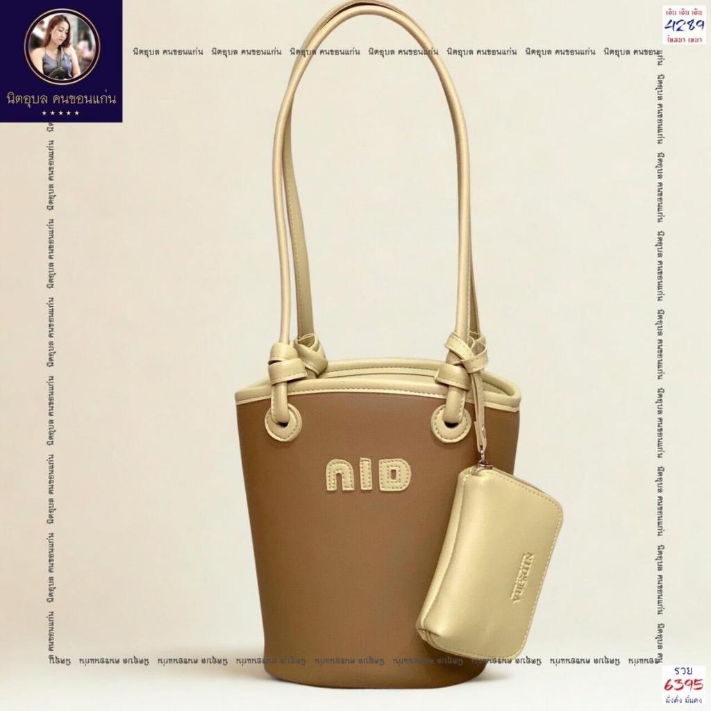 899 กระเป๋ารุ่นหูผูก NIDORA งานแท้ รุ่นใบกลาง  ขนาด กว้าง 9 นิ้ว สูง 9 นิ้ว หนา 5 นิ้ว งานหนังหนาสวย